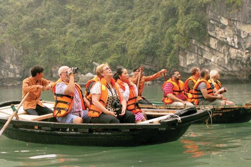 Explore Halong Bay on bamboo boat